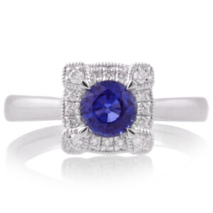 A platinum, sapphire and diamond set square shaped cluster ring.