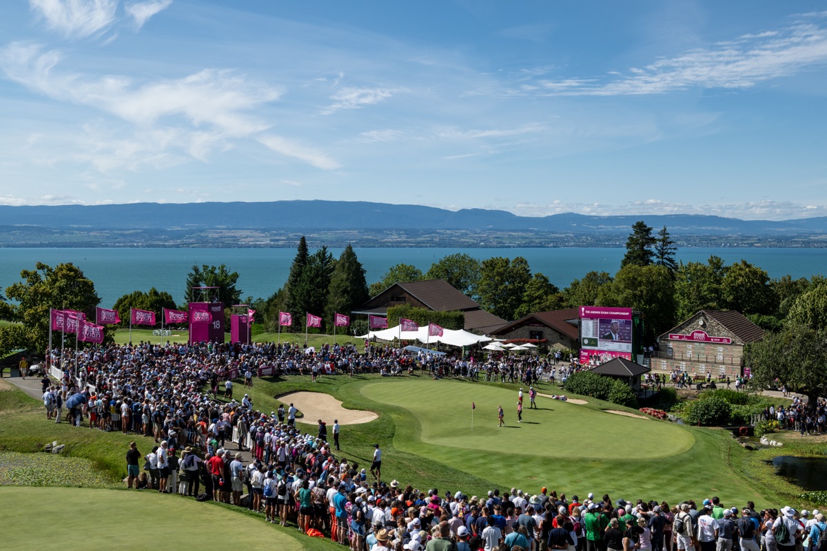 Picture of The Open of golf 2024 showing audience gathered aroung two players