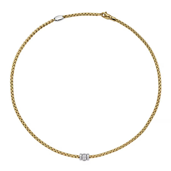 An 18ct yellow and white gold Flex'It necklace with three white gold diamond set rondels, belonging to FOPE's Eka collection.