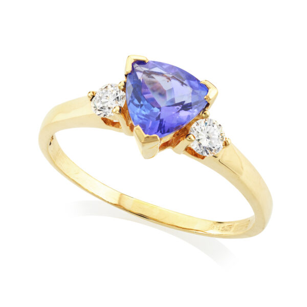 An 18ct yellow gold trilliant cut tanzanite three stone ring set with two brilliant cut diamonds to each side.