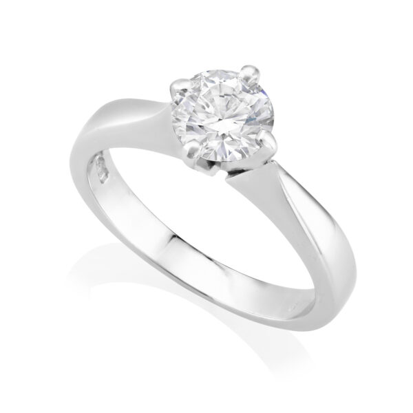 A platinum round brilliant diamond single stone solitaire ring.