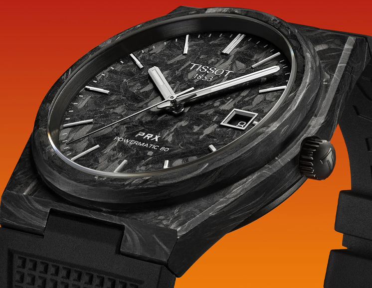 Tissot PRX Carbon watch with a black dial and strap.