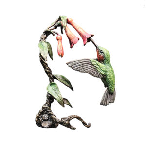 Made from solid foundry bronze, this piece depicts a hummingbird searching for nectar within a flower.